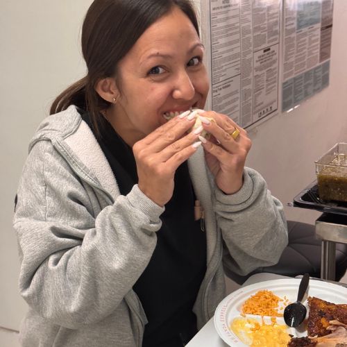 A woman enjoying a meal